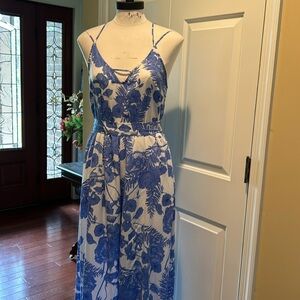 Blue and white tropical print jumpsuit.